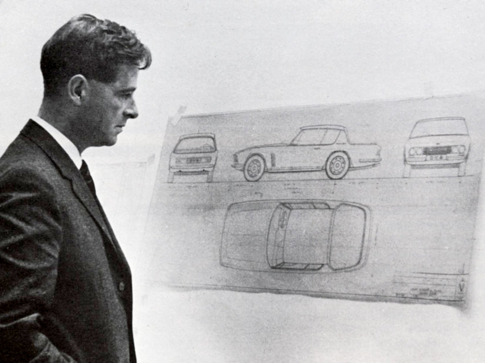Kevin Beattie looking at a drawing of the Italian designed Interceptor.